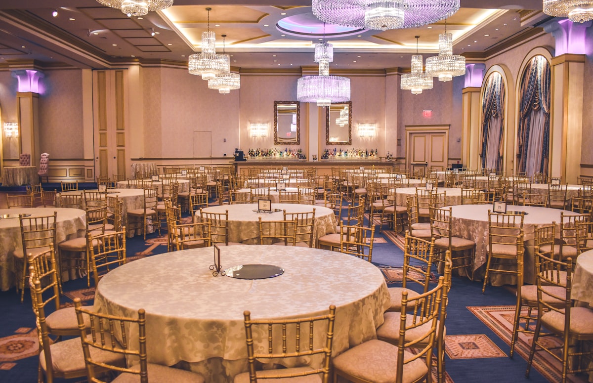 Elegant event setup with balloons and tablescape